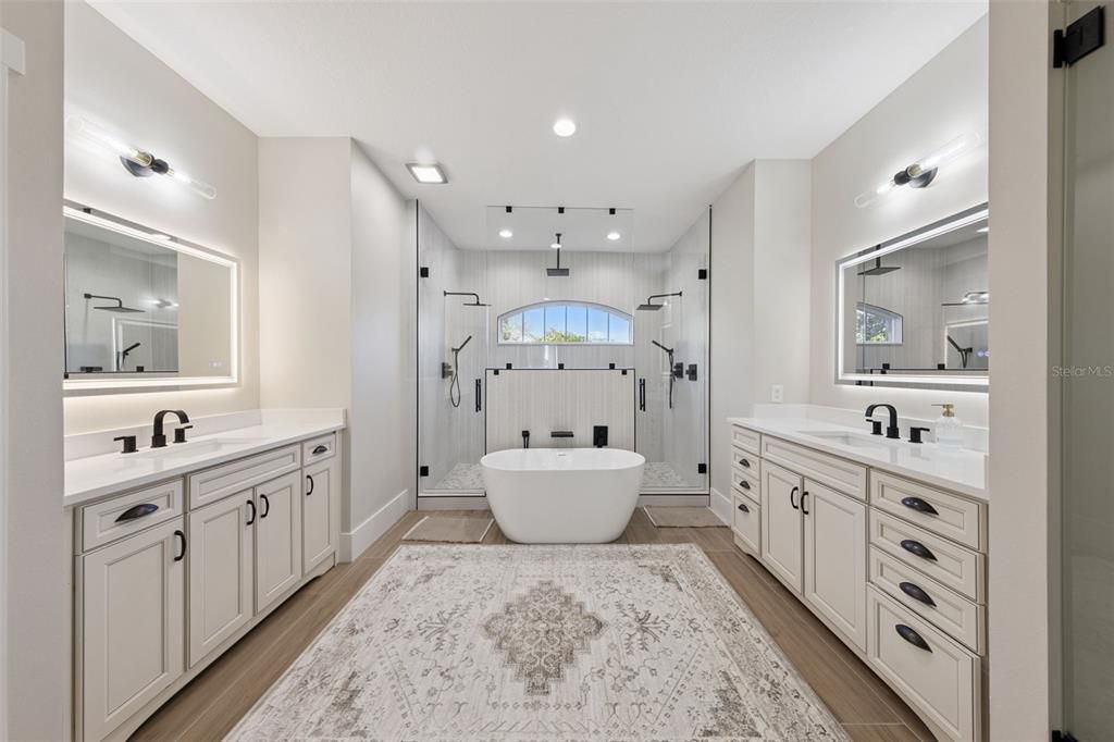 Bathroom, Dual Sink Vanities, Free Standing Baths, Glass Shower, Interior, Recessed Lighting, Wood Texture Flooring