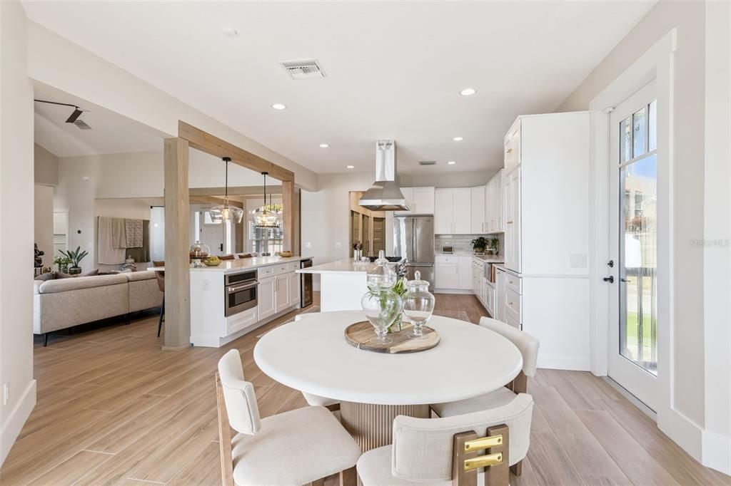 Dining room, Interior, Kitchen, Living room, Pendant Lights, Recessed Lighting, Stainless Steel Appliances, Wood Texture Flooring