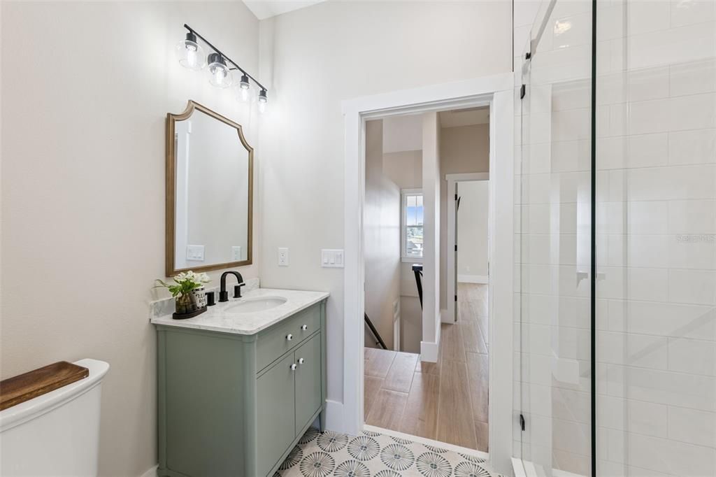 Bathroom, Dual Sink Vanities, Glass Shower, Interior, Wood Texture Flooring