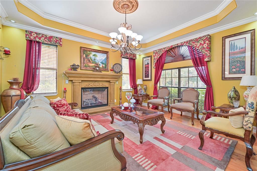 Chandelier, Fireplace, Interior, Living room, Recessed Lighting, Wood Texture Flooring