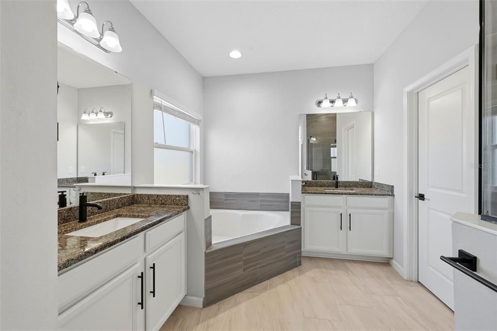 Bathroom, Dual Sink Vanities, Interior, Recessed Lighting, Wood Texture Flooring
