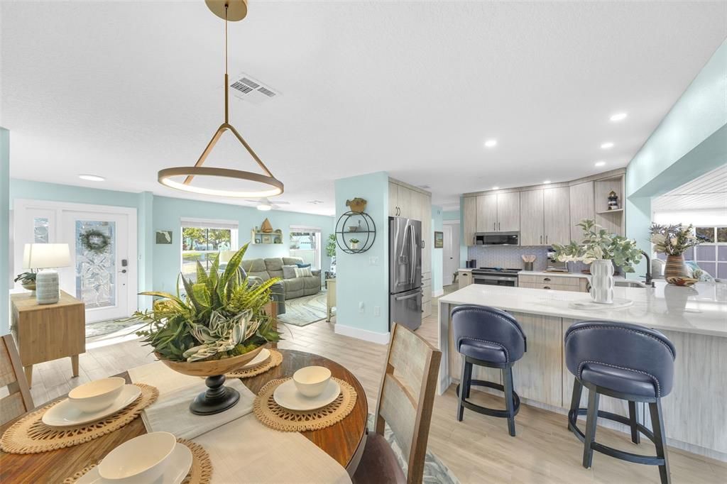 Dining room, Interior, Kitchen, Pendant Lights, Recessed Lighting, Stainless Steel Appliances, Wood Texture Flooring