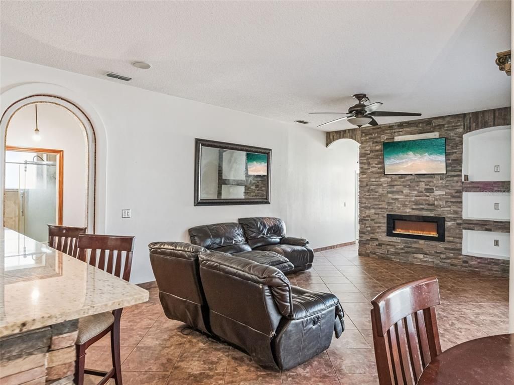 Dining room, Fireplace, Interior, Living room, Stone Walls