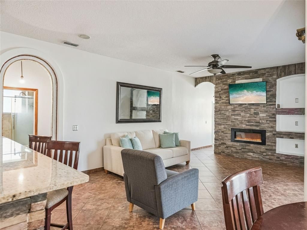 Dining room, Fireplace, Interior, Living room, Stone Walls