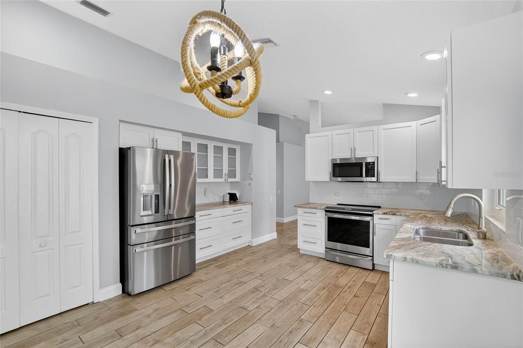 Interior, Kitchen, Recessed Lighting, Stainless Steel Appliances, Wood Texture Flooring