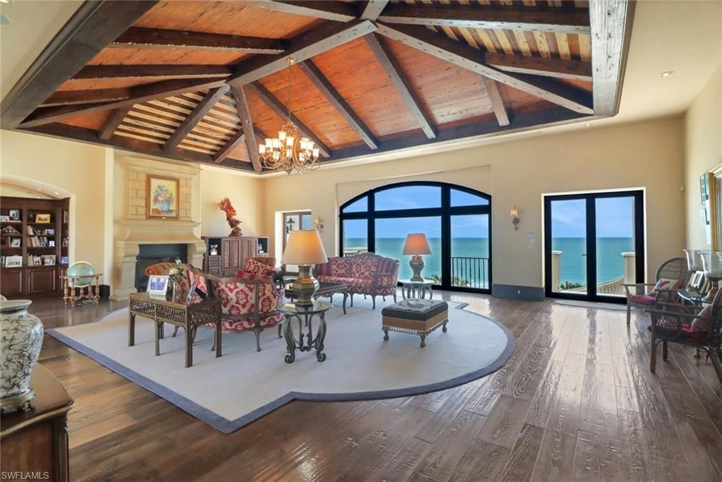 Chandelier, Fireplace, Interior, Living room, Water, Wooden Beams, Wooden Ceilings, Wood Texture Flooring