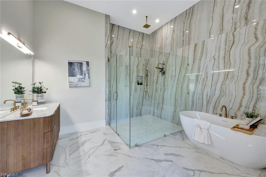 Bathroom, Free Standing Baths, Glass Shower, Interior, Marble, Marble Walls, Recessed Lighting