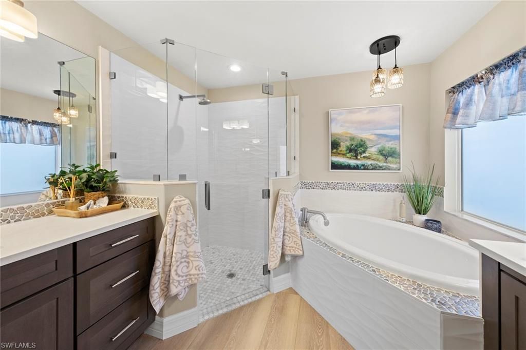 Bathroom, Glass Shower, Interior, Pendant Lights, Recessed Lighting, Wood Texture Flooring