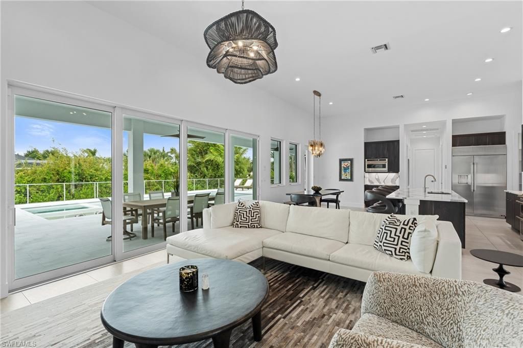 Dining room, Interior, Kitchen, Living room, Pendant Lights, Recessed Lighting, Stainless Steel Appliances, Wood Texture Flooring