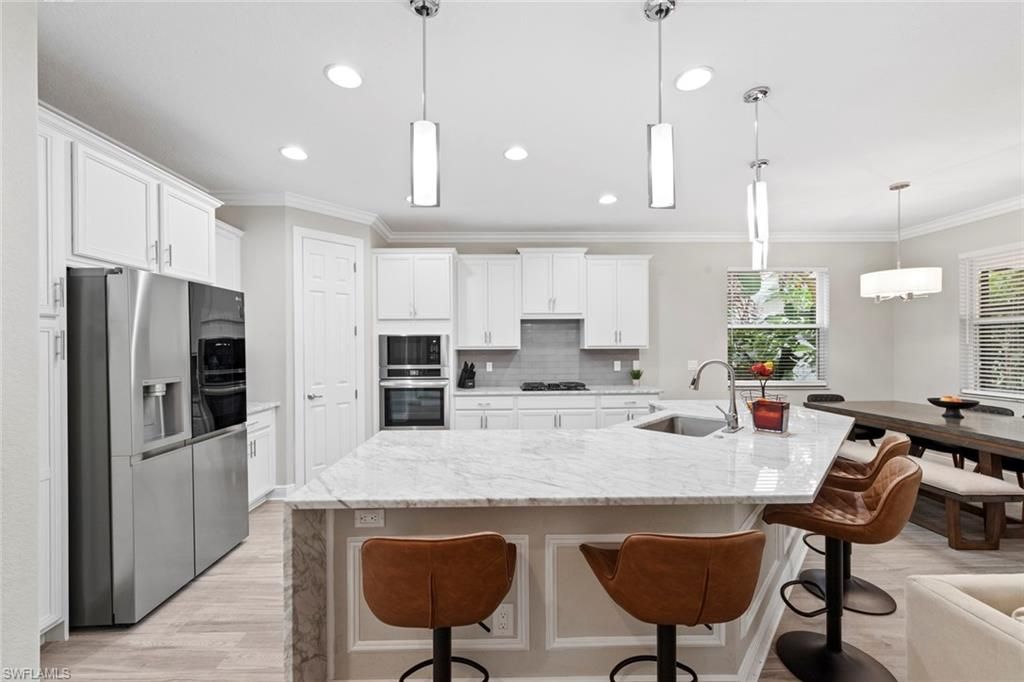Interior, Kitchen, Pendant Lights, Recessed Lighting, Stainless Steel Appliances, Wood Texture Flooring