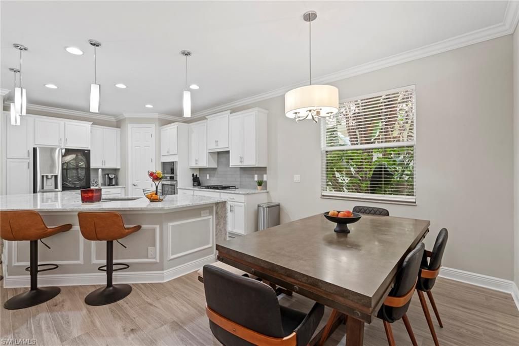 Dining room, Interior, Kitchen, Pendant Lights, Recessed Lighting, Stainless Steel Appliances, Wood Texture Flooring