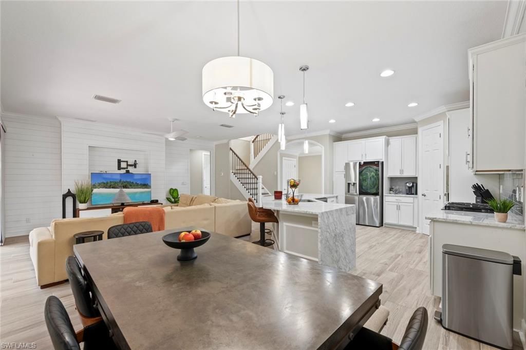 Dining room, Interior, Kitchen, Living room, Pendant Lights, Recessed Lighting, Stainless Steel Appliances, Wood Texture Flooring