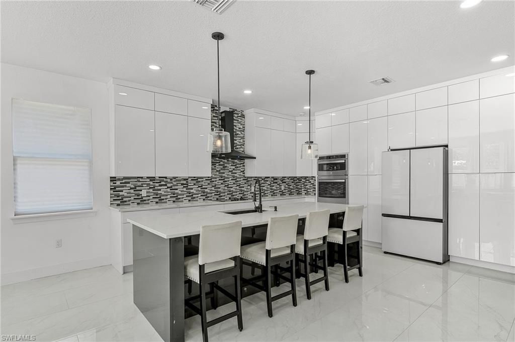 Interior, Kitchen, Marble, Pendant Lights, Recessed Lighting, Stainless Steel Appliances