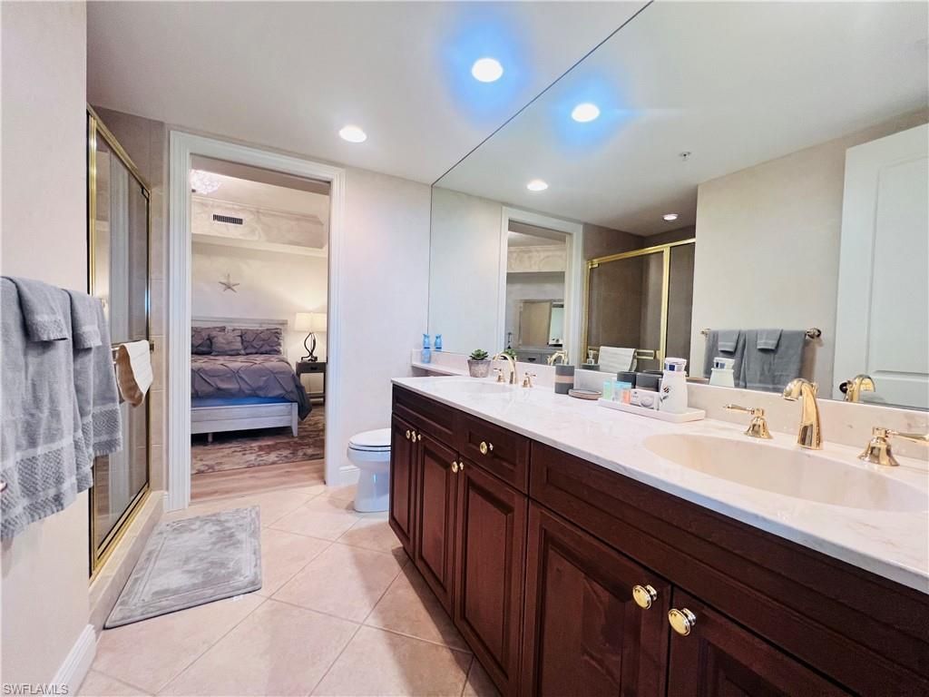 Bathroom, Bedroom, Dual Sink Vanities, Glass Shower, Interior, Recessed Lighting, Wood Texture Flooring