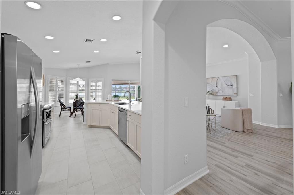 Dining room, Interior, Kitchen, Pendant Lights, Recessed Lighting, Stainless Steel Appliances, Wood Texture Flooring