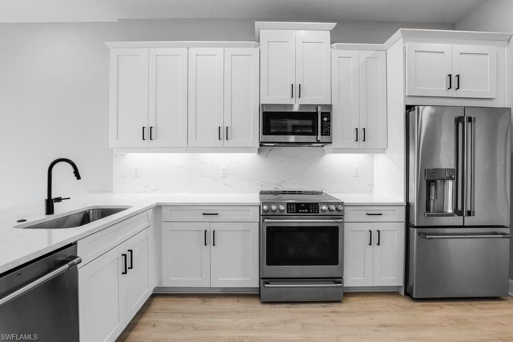 Interior, Kitchen, Marble Walls, Stainless Steel Appliances, Wood Texture Flooring