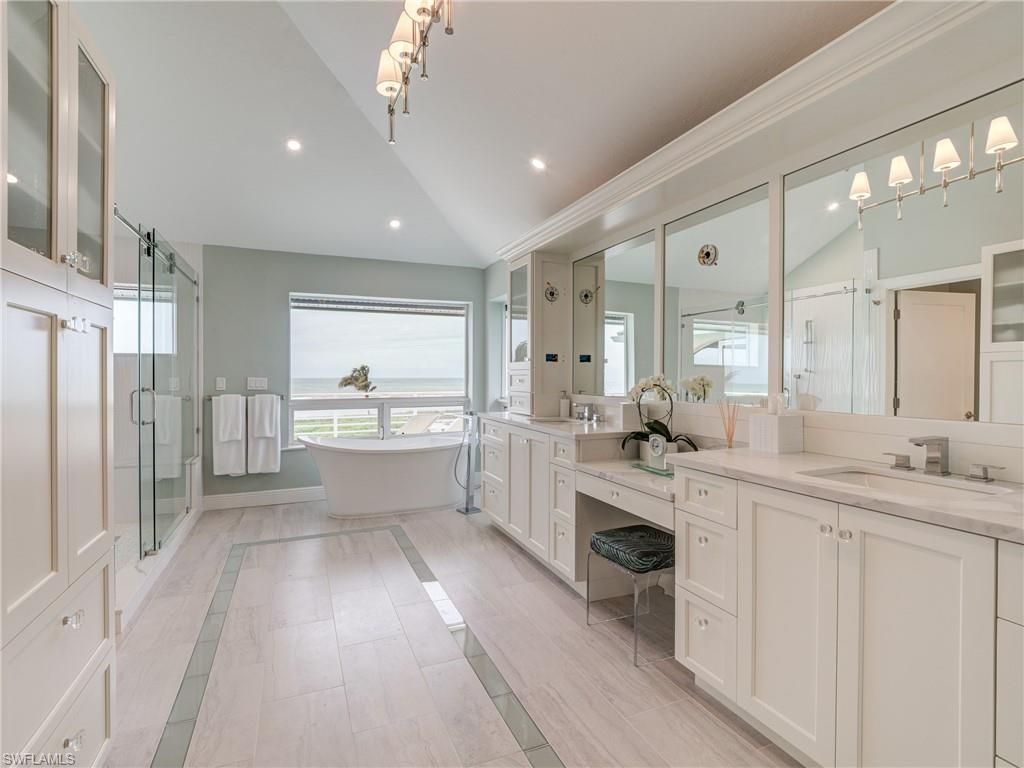 Bathroom, Dual Sink Vanities, Free Standing Baths, Glass Shower, Interior, Recessed Lighting, Wood Texture Flooring