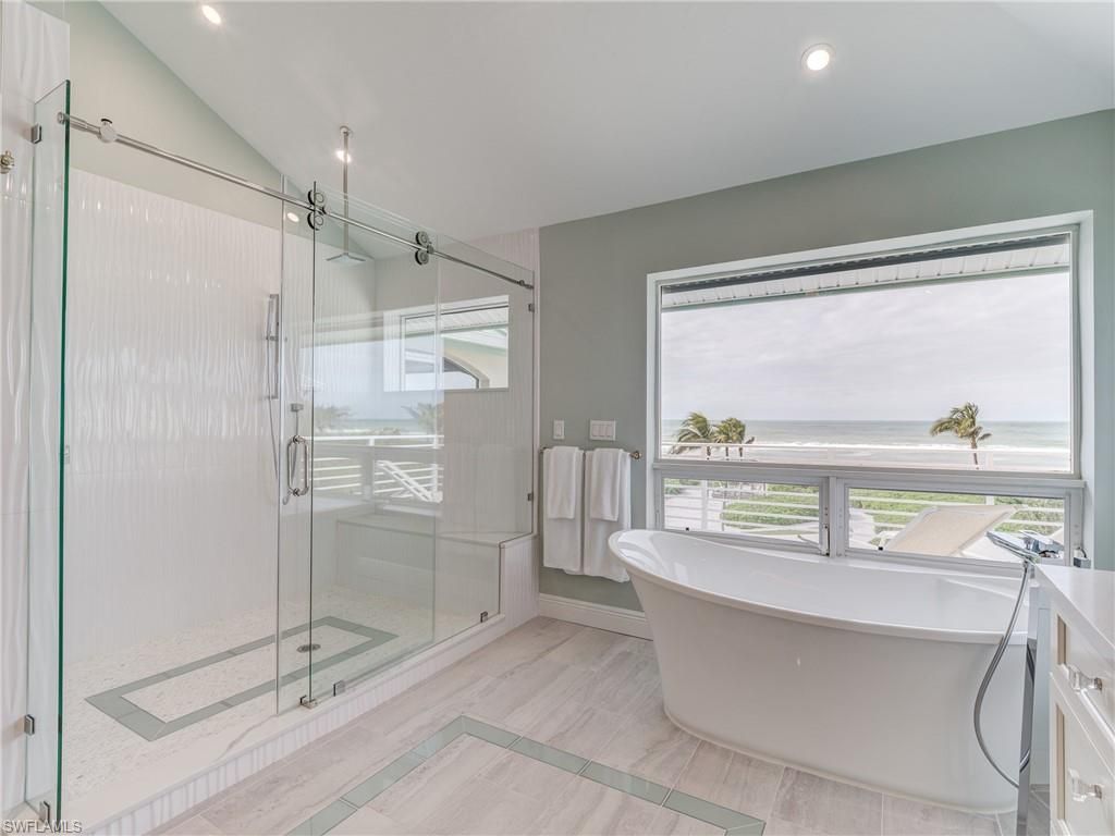 Bathroom, Free Standing Baths, Glass Shower, Interior, Recessed Lighting, Water, Wood Texture Flooring