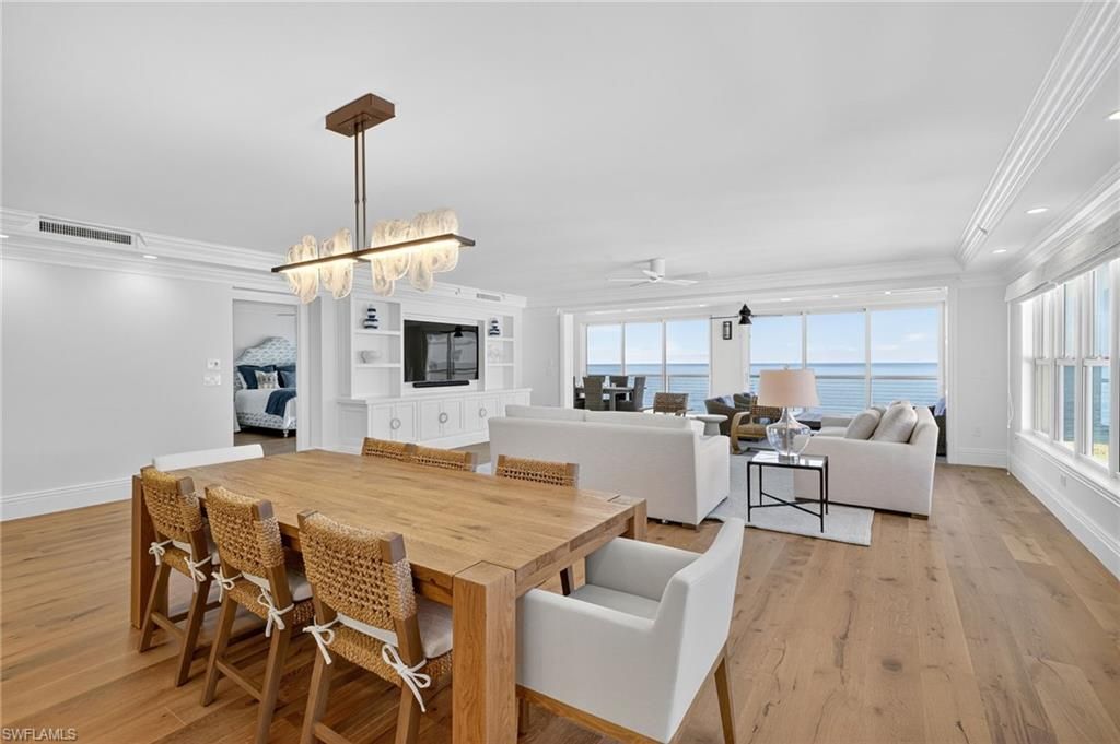 Chandelier, Dining room, Interior, Living room, Pendant Lights, Recessed Lighting, Water, Wood Texture Flooring