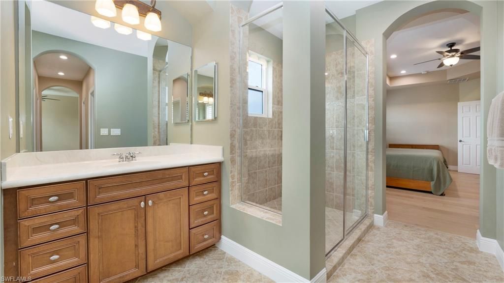 Bathroom, Bedroom, Glass Shower, Interior, Recessed Lighting, Wood Texture Flooring