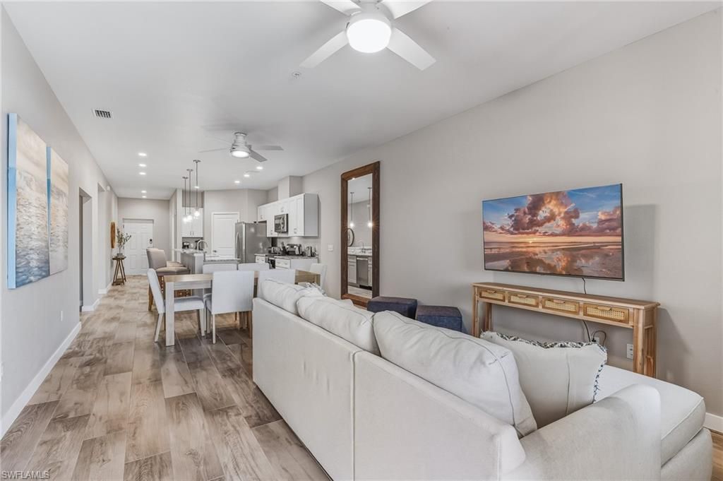 Dining room, Interior, Kitchen, Living room, Pendant Lights, Recessed Lighting, Stainless Steel Appliances, Wood Texture Flooring