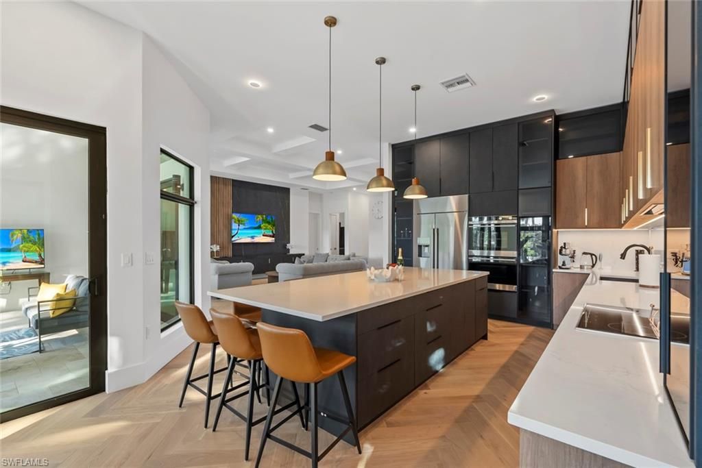 Interior, Kitchen, Pendant Lights, Recessed Lighting, Stainless Steel Appliances, Wood Texture Flooring