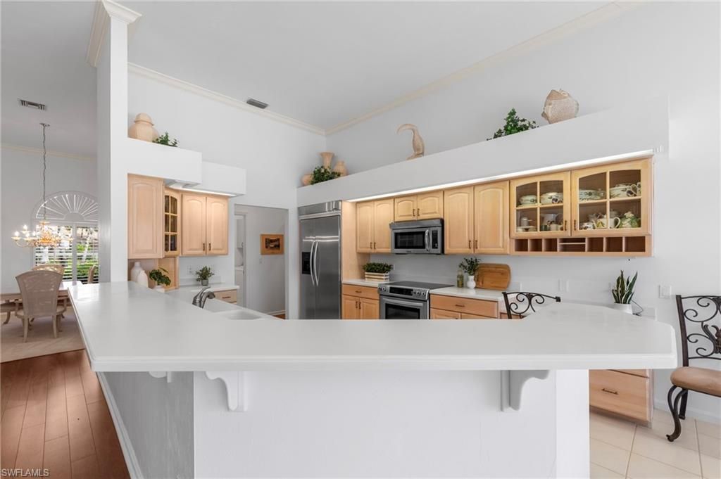 Dining room, Interior, Kitchen, Pendant Lights, Stainless Steel Appliances, Wood Texture Flooring