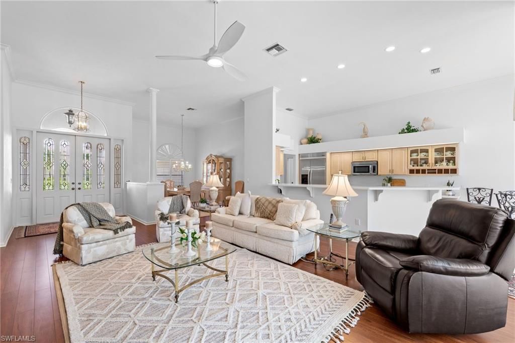 Dining room, Interior, Kitchen, Living room, Pendant Lights, Recessed Lighting, Stainless Steel Appliances, Wood Texture Flooring