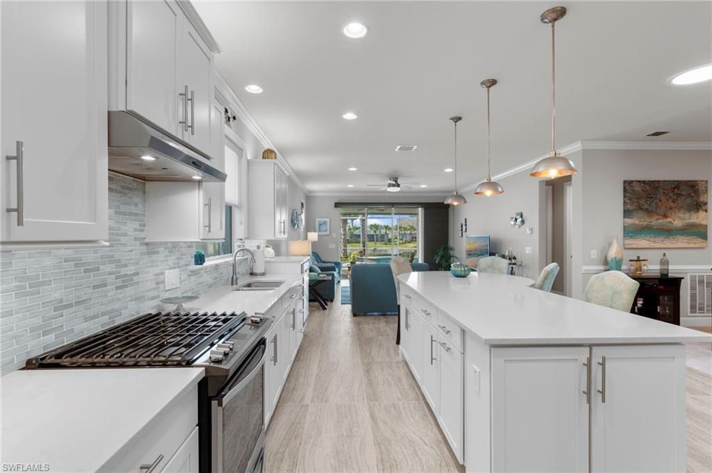 Dining room, Interior, Kitchen, Living room, Pendant Lights, Recessed Lighting, Stainless Steel Appliances, Wood Texture Flooring