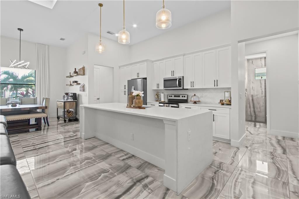 Dining room, Interior, Kitchen, Marble, Pendant Lights, Recessed Lighting, Stainless Steel Appliances