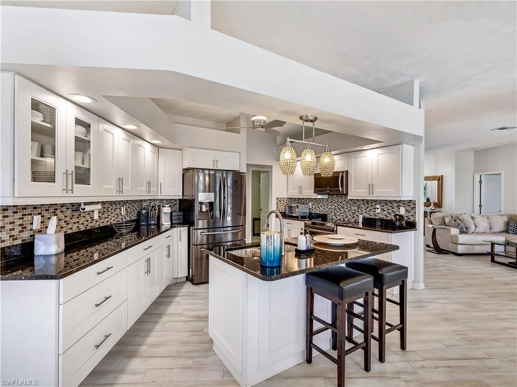 Interior, Kitchen, Living room, Pendant Lights, Recessed Lighting, Stainless Steel Appliances, Wood Texture Flooring