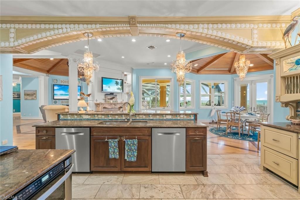 Chandelier, Dining room, Interior, Kitchen, Recessed Lighting, Stainless Steel Appliances, Wooden Beams, Wooden Ceilings, Wood Texture Flooring