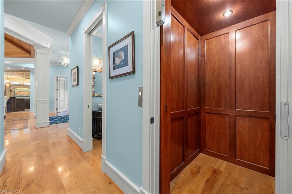 Elevator, Interior, Recessed Lighting, Wood Texture Flooring, Wooden Walls