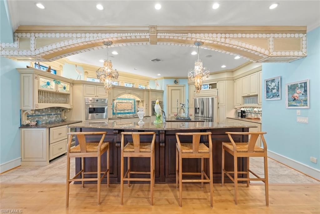 Chandelier, Interior, Kitchen, Recessed Lighting, Stainless Steel Appliances, Wood Texture Flooring