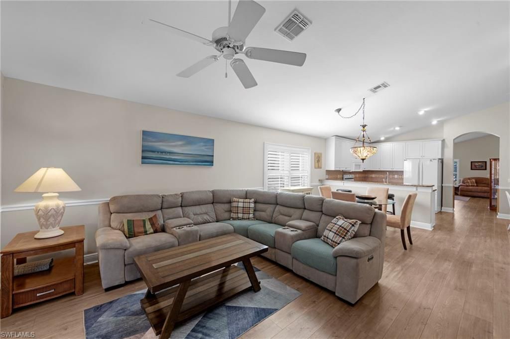 Chandelier, Dining room, Interior, Kitchen, Living room, Pendant Lights, Recessed Lighting, Wood Texture Flooring