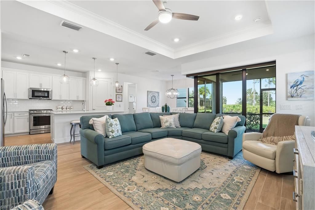 Dining room, Interior, Kitchen, Living room, Pendant Lights, Recessed Lighting, Stainless Steel Appliances, Wood Texture Flooring