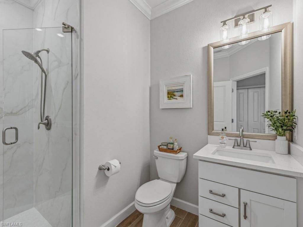 Bathroom, Glass Shower, Interior, Marble Walls, Wood Texture Flooring