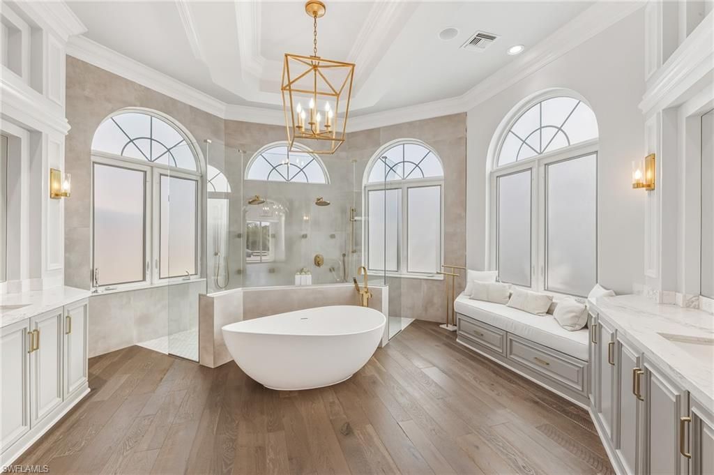 Bathroom, Free Standing Baths, Glass Shower, Interior, Pendant Lights, Recessed Lighting, Wood Texture Flooring