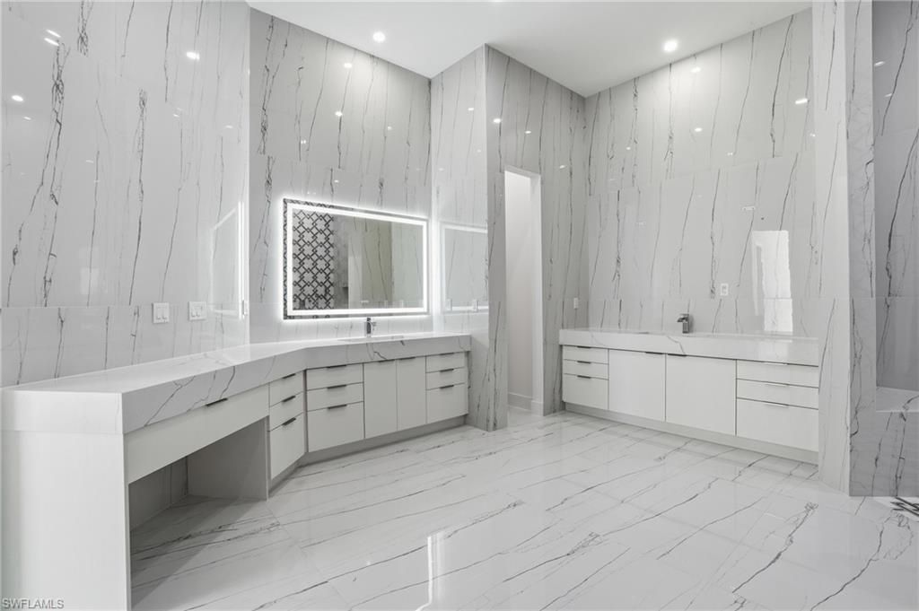 Bathroom, Dual Sink Vanities, Interior, Marble, Marble Walls, Recessed Lighting