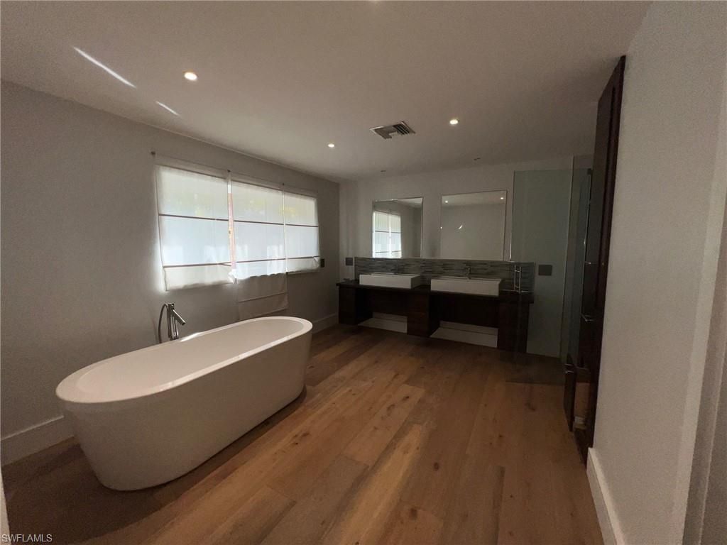 Bathroom, Free Standing Baths, Interior, Recessed Lighting, Wood Texture Flooring
