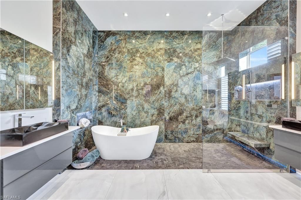Bathroom, Free Standing Baths, Glass Shower, Interior, Marble Walls, Recessed Lighting