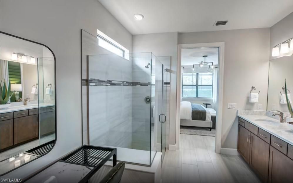 Bathroom, Bedroom, Dual Sink Vanities, Glass Shower, Interior, Recessed Lighting, Water, Wood Texture Flooring