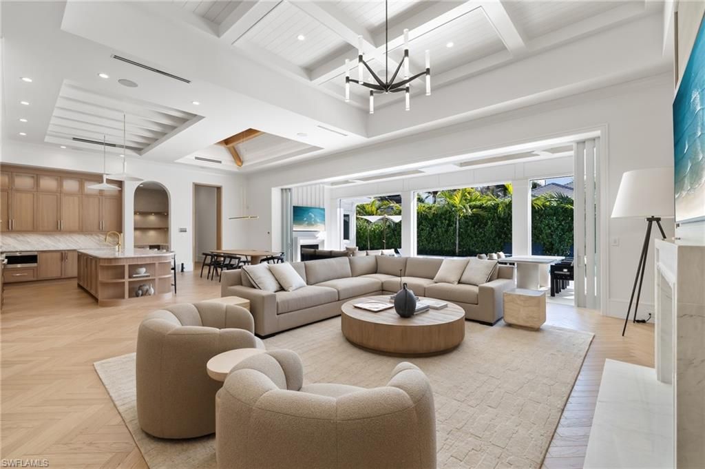 Chandelier, Interior, Kitchen, Living room, Pendant Lights, Recessed Lighting, Stainless Steel Appliances, Wood Texture Flooring