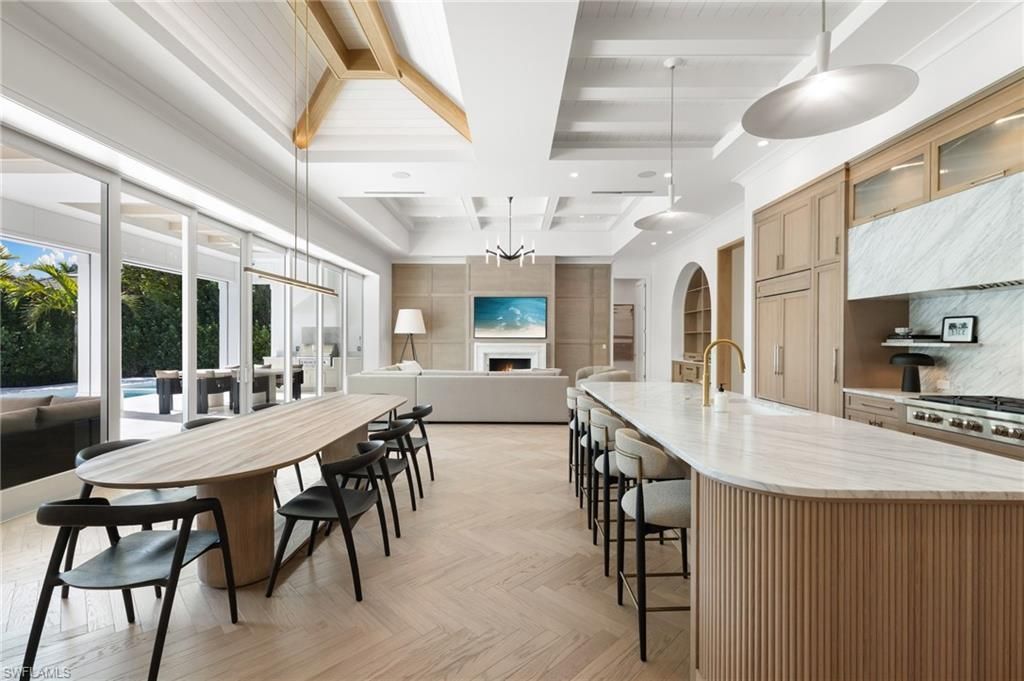 Dining room, Fireplace, Interior, Kitchen, Living room, Pendant Lights, Recessed Lighting, Stainless Steel Appliances, Wooden Beams, Wood Texture Flooring