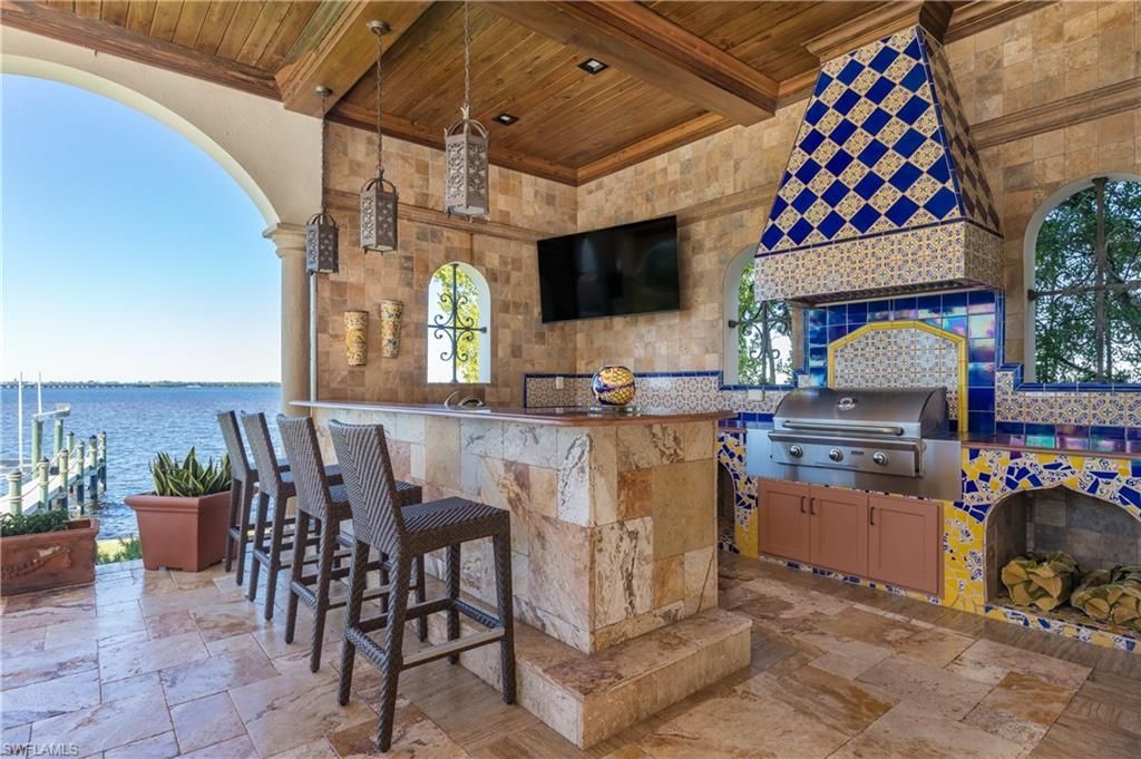 Exterior, Fireplace, Outdoor Kitchen, Recessed Lighting, Water