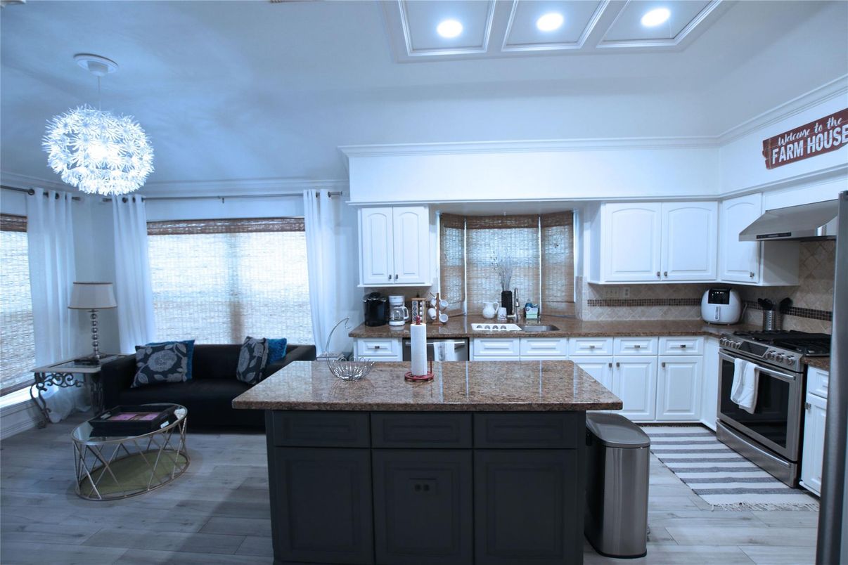 Chandelier, Interior, Kitchen, Living room, Recessed Lighting, Stainless Steel Appliances, Wood Texture Flooring