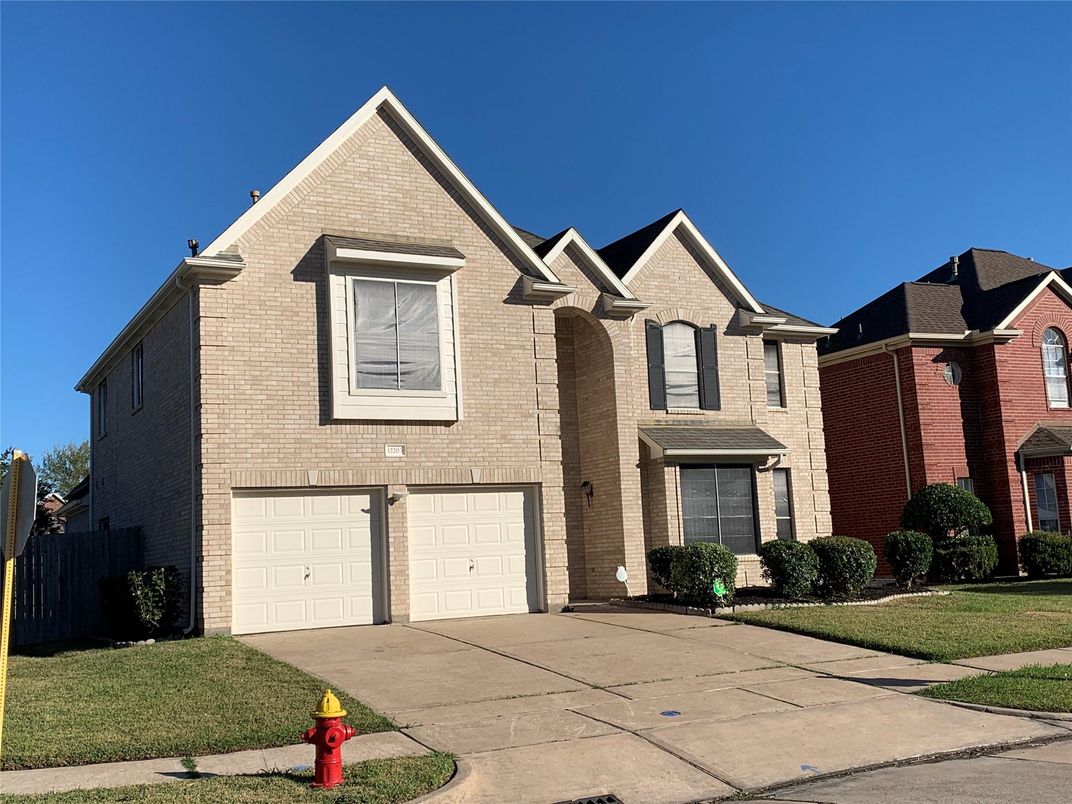 Attached, Exterior, Facade, Brick Facade, Brick Traditional