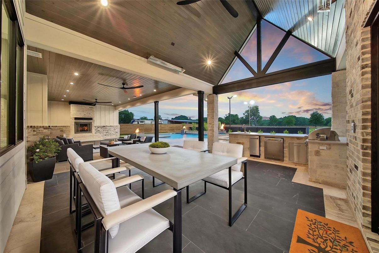 Exterior, Fireplace, Outdoor Kitchen, Water