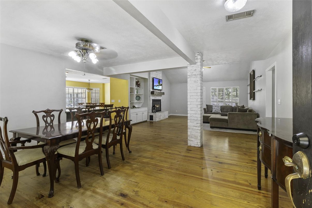 Dining room, Fireplace, Interior, Living room, Pendant Lights, Wood Texture Flooring