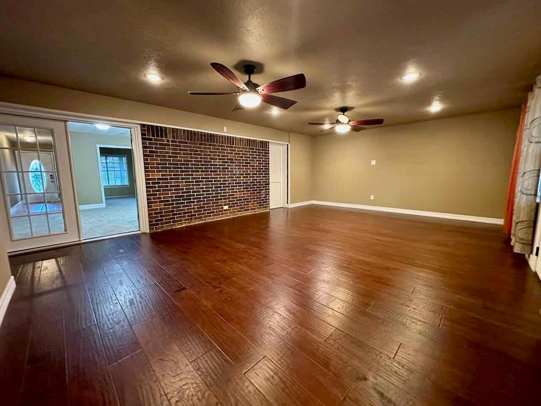 Empty room, Interior, Recessed Lighting, Stone Walls, Wood Texture Flooring